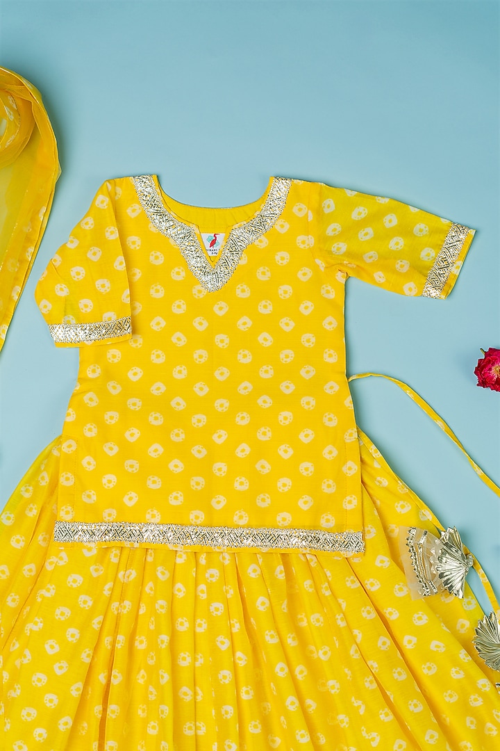 Yellow Chanderi Floral Printed Bandhej Lehenga Set For Girls by Yuvrani Jaipur Kidswear at Pernia's Pop Up Shop
