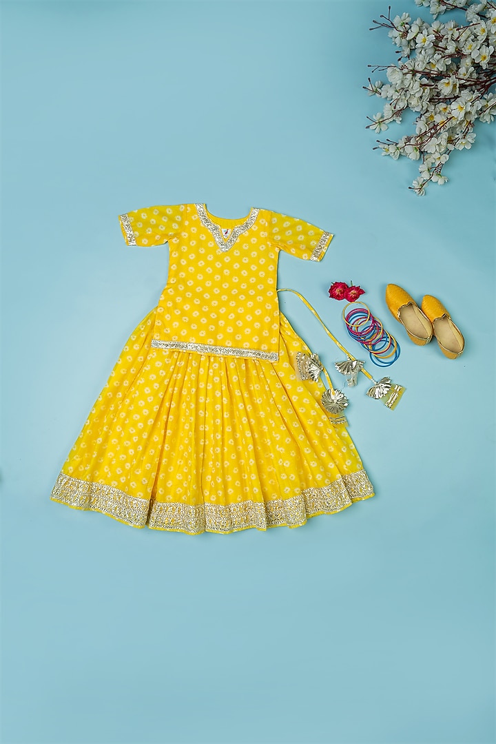 Yellow Chanderi Floral Printed Bandhej Lehenga Set For Girls by Yuvrani Jaipur Kidswear at Pernia's Pop Up Shop