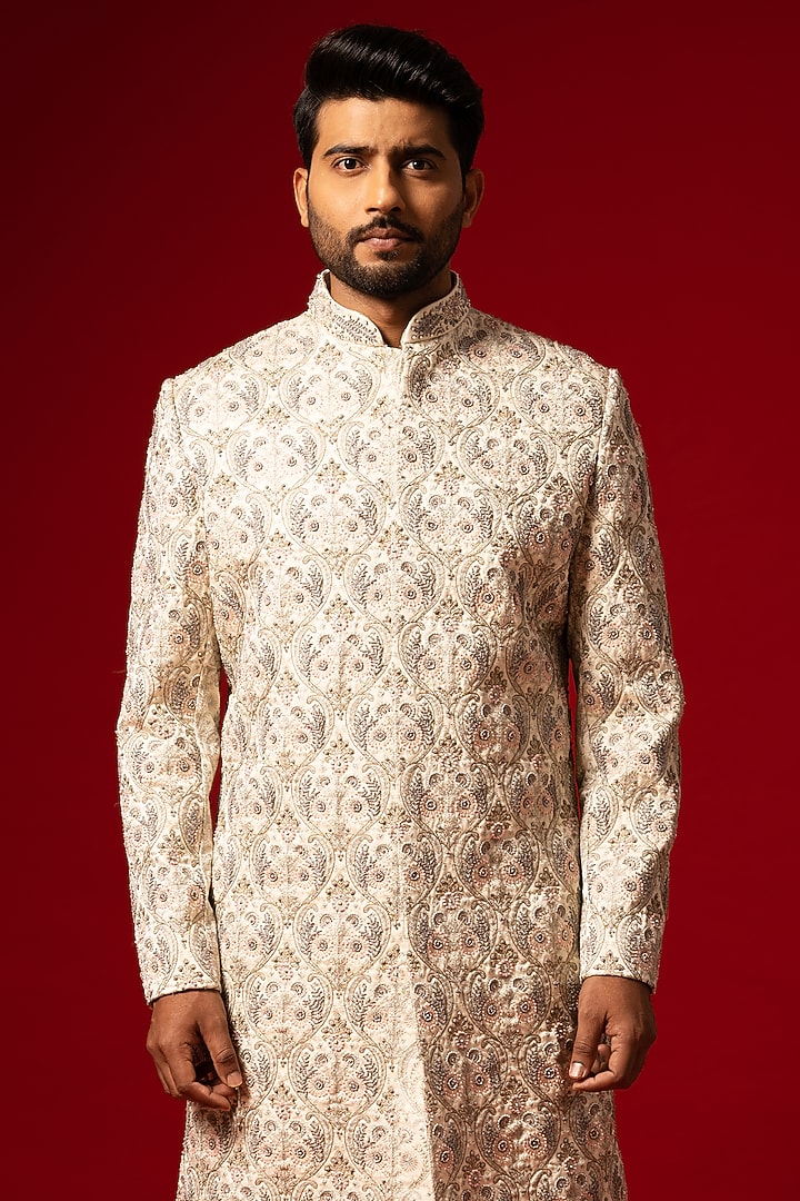Ivory Silk Embroidered Groom Sherwani Set by YOSEBA at Pernia's Pop Up Shop