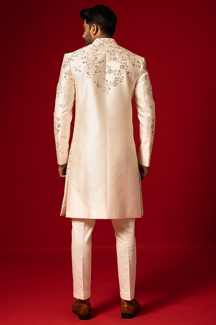 Ivory Silk Embroidered Groom Sherwani Set by YOSEBA at Pernia's Pop Up Shop
