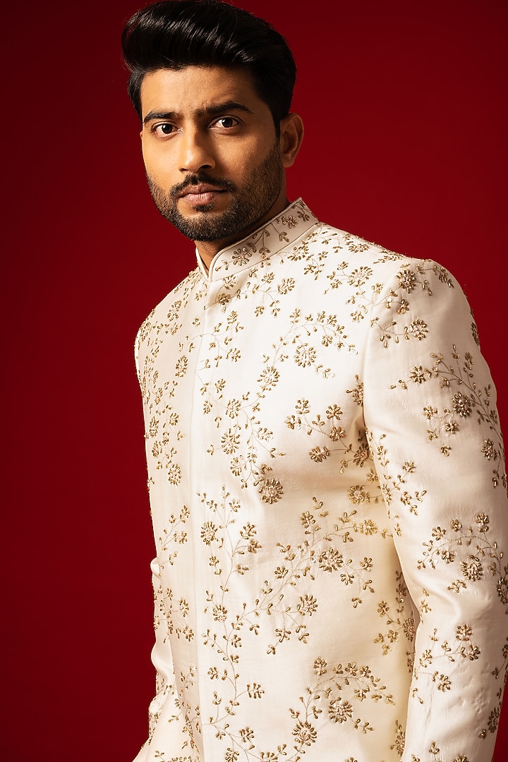 Ivory Silk Embroidered Groom Sherwani Set by YOSEBA at Pernia's Pop Up Shop