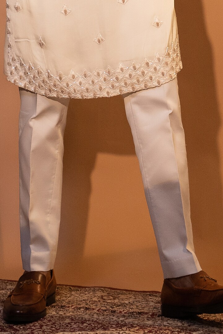 Ivory Linen Satin Embroidered Kurta Set by YOSEBA at Pernia's Pop Up Shop
