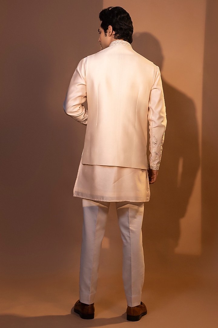Peachish Pink Chanderi Silk Embroidered Nehru Jacket Set by YOSEBA at Pernia's Pop Up Shop