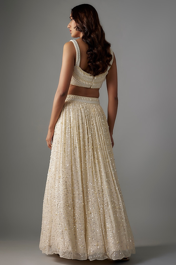 Ivory Georgette Sequins & Tassels Embroidered Wedding Lehenga Set by Yoshita Couture at Pernia's Pop Up Shop