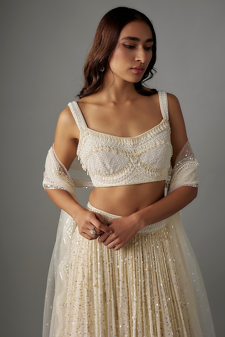 Ivory Georgette Sequins & Tassels Embroidered Wedding Lehenga Set by Yoshita Couture at Pernia's Pop Up Shop
