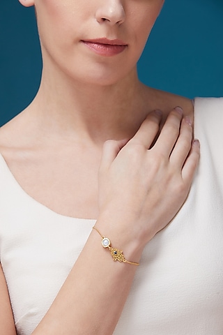 Gold Plated Hand Of Hamsa Bracelet by Zariin