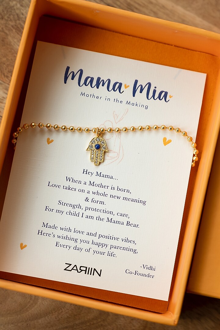 Gold Plated Cubic Zircon & Lapis Lazuli Hamsa Hand Bracelet by Zariin at Pernia's Pop Up Shop