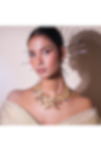 Two-Tone Finish Embellished Leaf-Shaped Necklace by ZAZA BY SOMYA at Pernia's Pop Up Shop