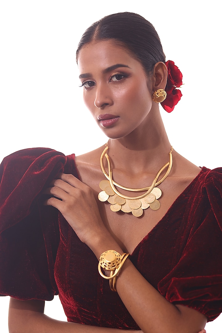 Gold Finish Round Ornate Bracelet by ZAZA BY SOMYA at Pernia's Pop Up Shop