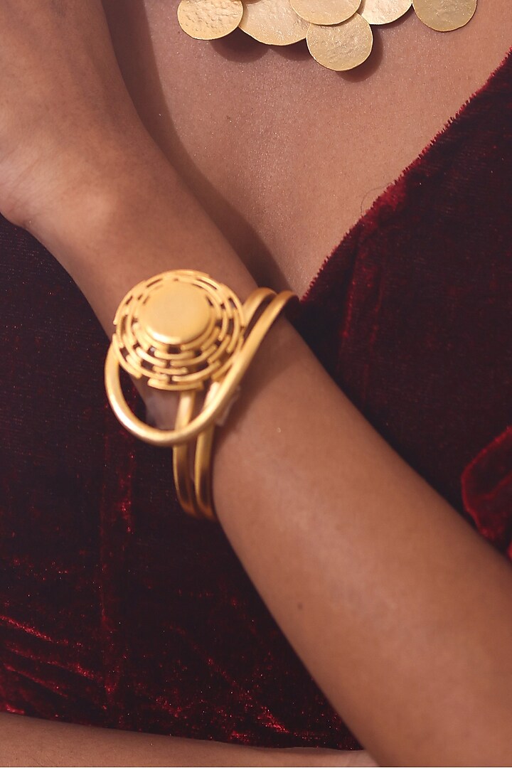 Gold Finish Round Ornate Bracelet by ZAZA BY SOMYA at Pernia's Pop Up Shop