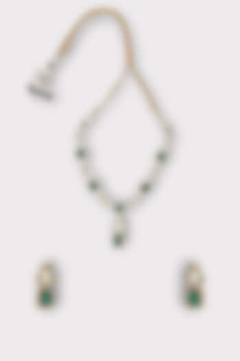 White Finish Faux Diamond & Emerald Stone Enameled Necklace Set by ZAZA BY SOMYA at Pernia's Pop Up Shop