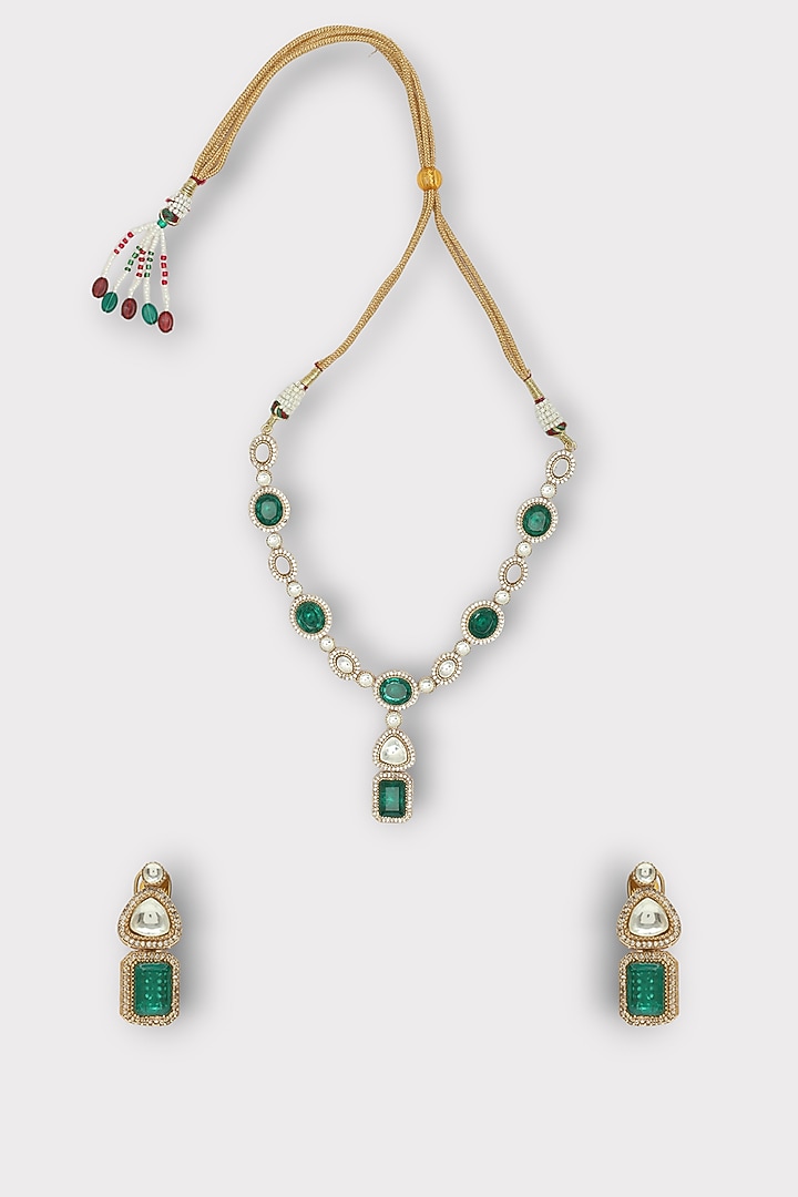 White Finish Faux Diamond & Emerald Stone Enameled Necklace Set by ZAZA BY SOMYA at Pernia's Pop Up Shop