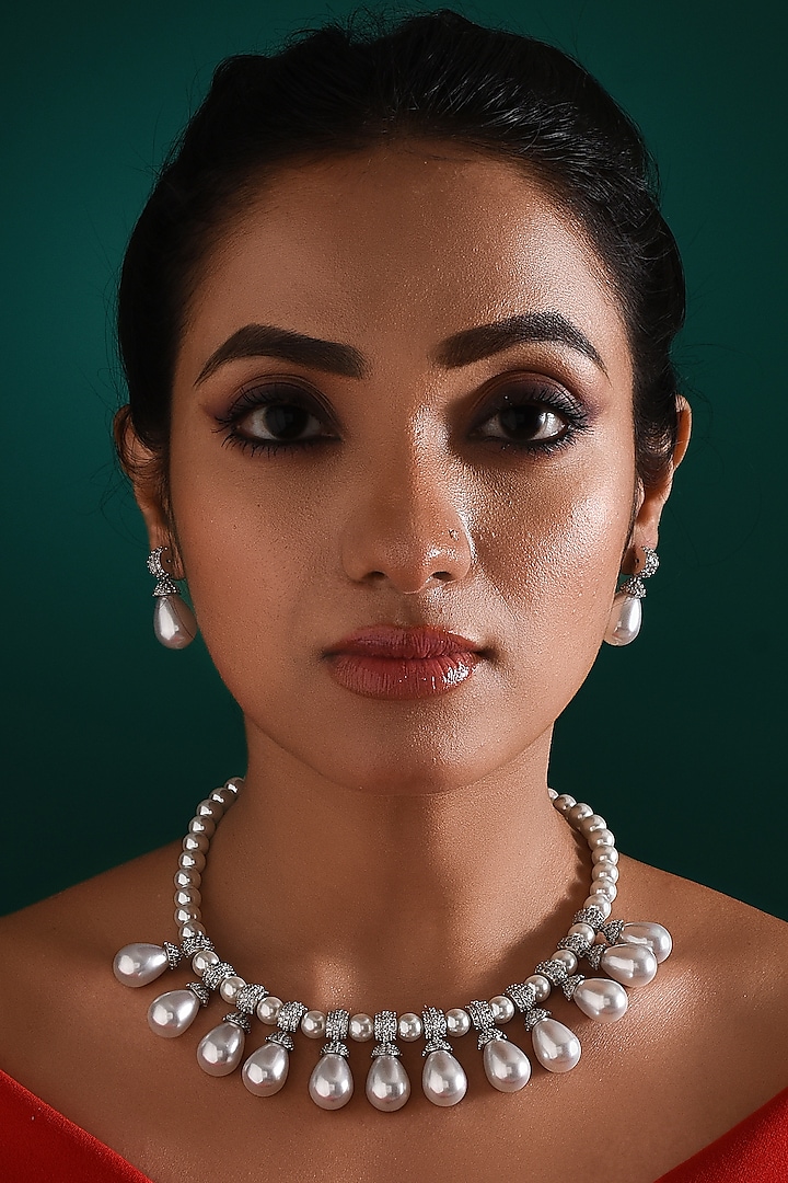 White Finish Zircon & Pearl Drop Necklace Set by ZAZA BY SOMYA at Pernia's Pop Up Shop