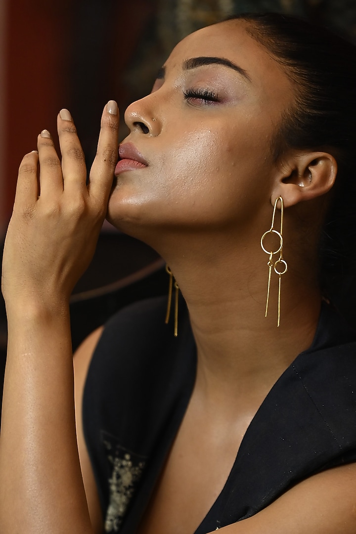 Matte Gold Finish Hanging Earrings by ZAZA BY SOMYA at Pernia's Pop Up Shop