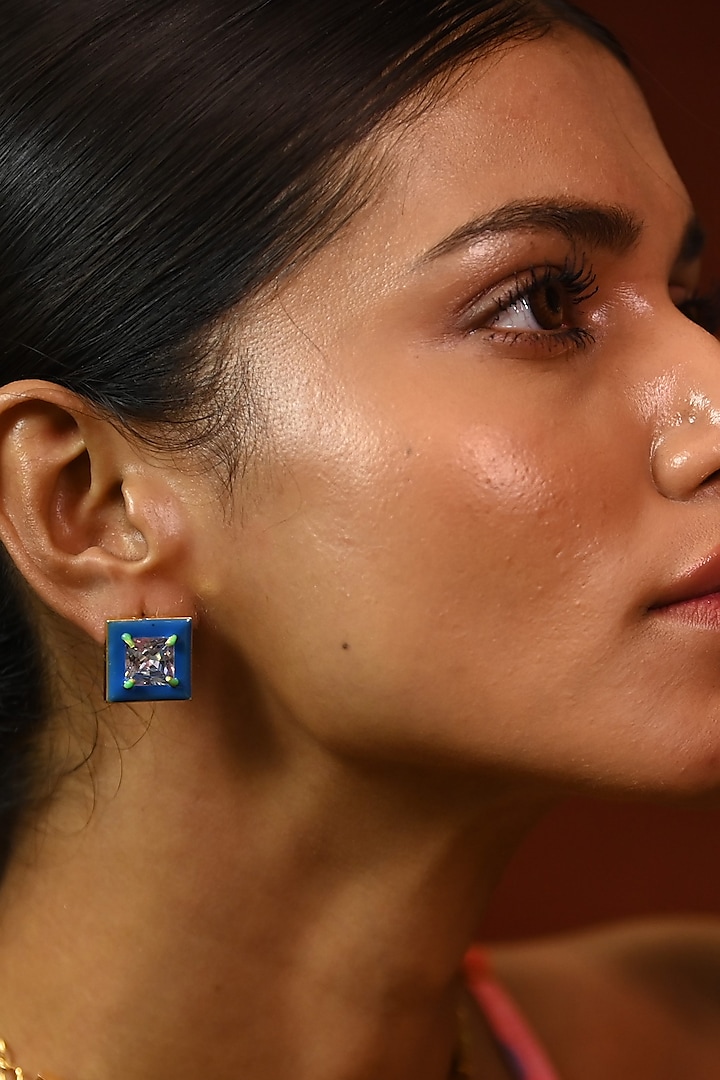 Gold Finish Square-Shaped Zircon Blue Enameled Stud Earrings by ZAZA BY SOMYA at Pernia's Pop Up Shop