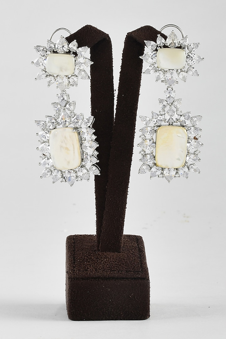 White Finish Zircon Dangler Earrings by ZAZA BY SOMYA