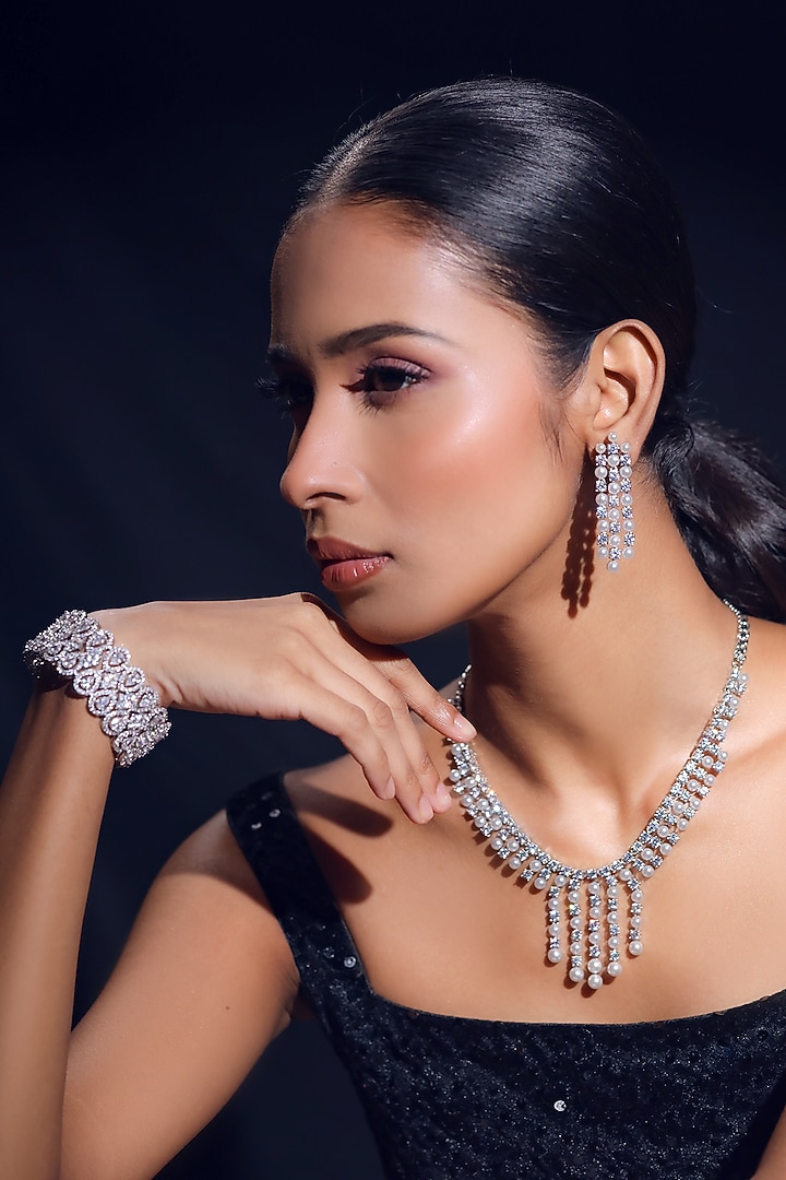 White Finish Pearl & Zircon Necklace Set by ZAZA BY SOMYA at Pernia's Pop Up Shop