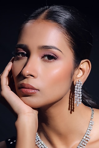 White Finish Pearl & Zircon Dangler Earrings by ZAZA BY SOMYA