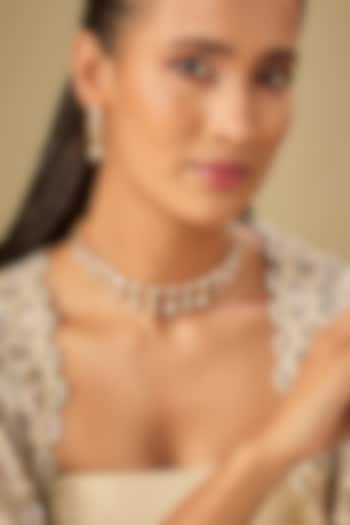 Gold Finish Moissanite Stone Necklace Set by Zevar By Geeta at Pernia's Pop Up Shop