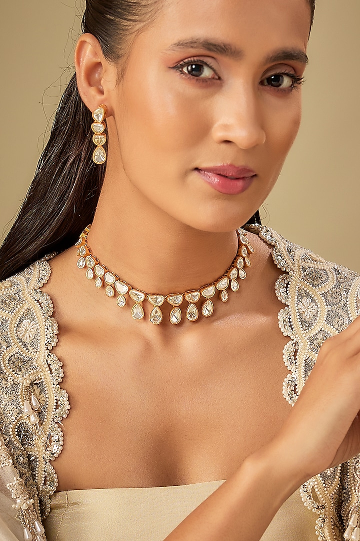 Gold Finish Moissanite Stone Necklace Set by Zevar By Geeta at Pernia's Pop Up Shop