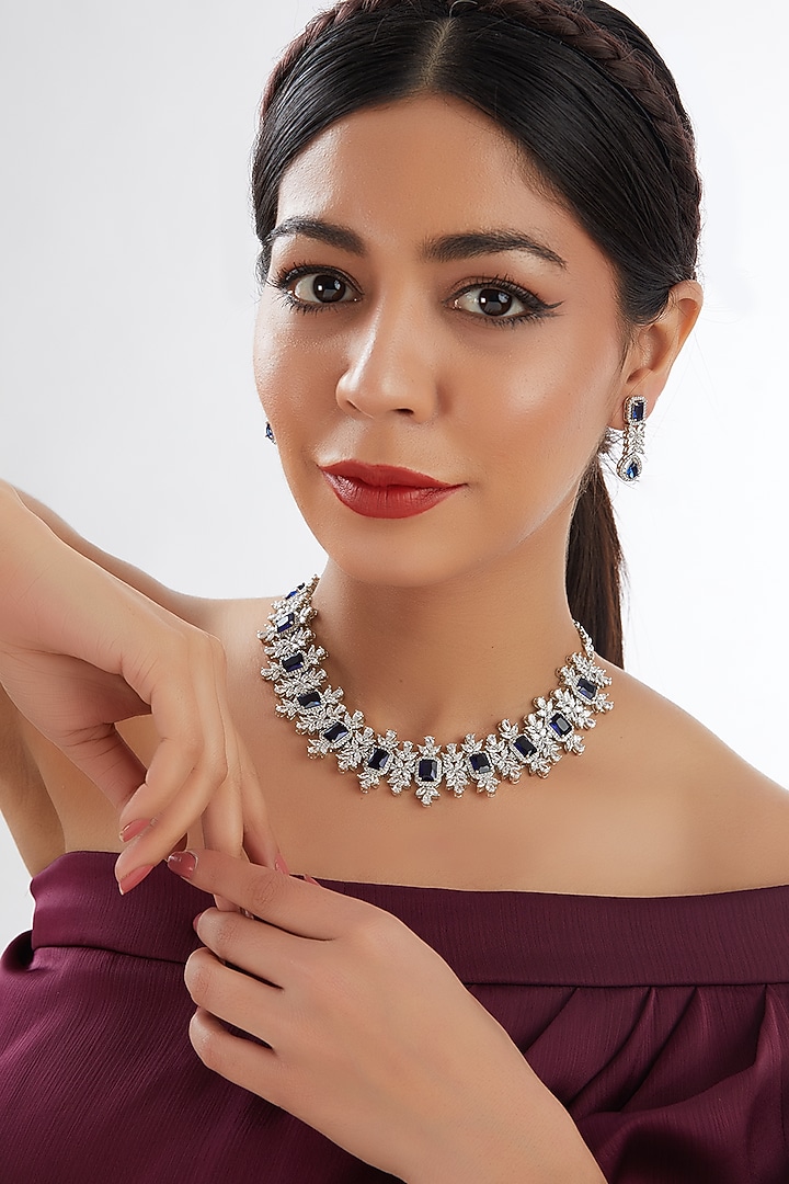 White Finish Faux Diamond & Blue Stone Necklace Set by Zevar By Geeta at Pernia's Pop Up Shop