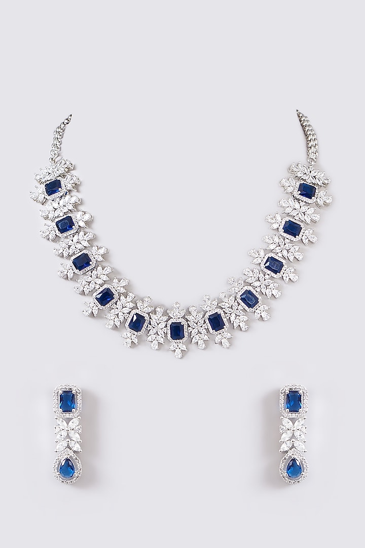 White Finish Faux Diamond & Blue Stone Necklace Set by Zevar By Geeta at Pernia's Pop Up Shop