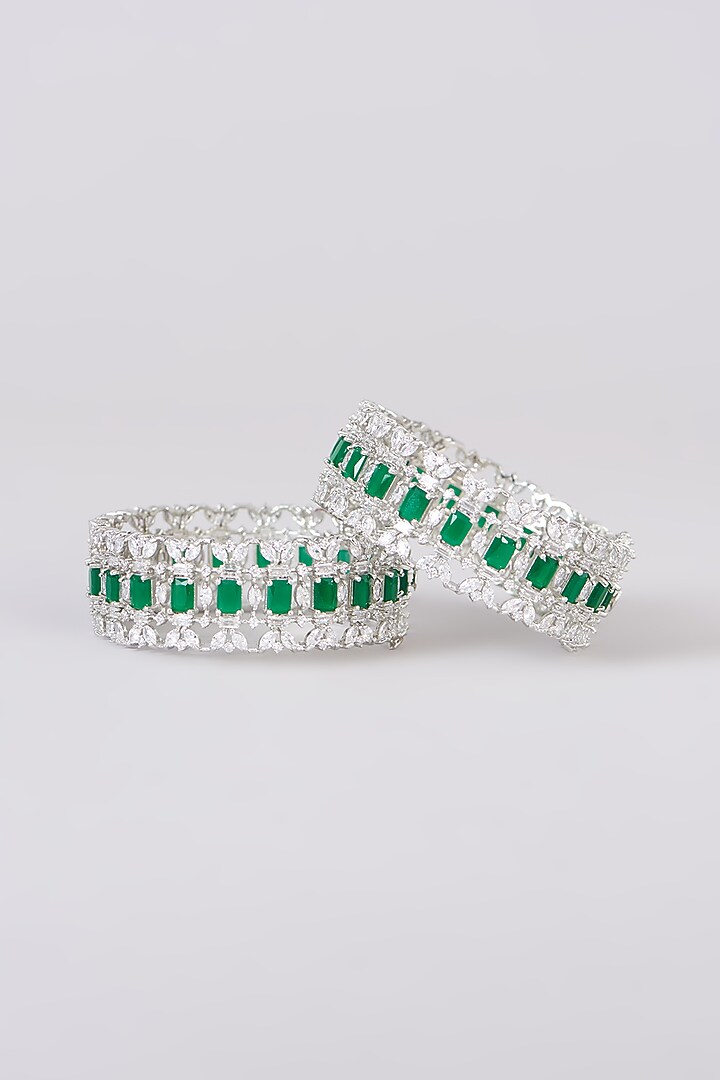 White Finish Faux Diamond & Green Stone Bangles (Set of 2) by Zevar By Geeta at Pernia's Pop Up Shop