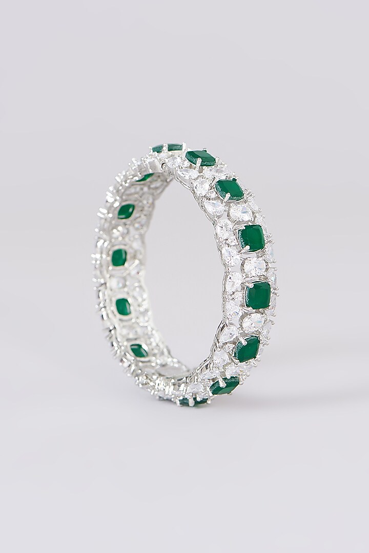 White Finish Faux Diamond & Emerald Stone Bangles (Set of 2) by Zevar By Geeta at Pernia's Pop Up Shop