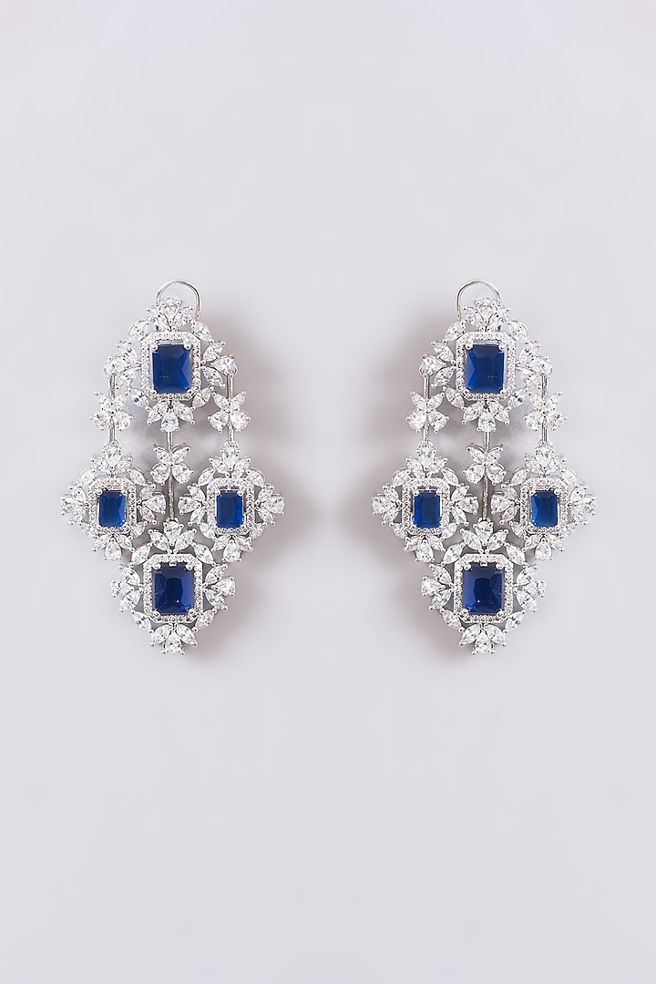 White Finish Faux Diamond & Blue Stone Dangler Earrings by Zevar By Geeta at Pernia's Pop Up Shop