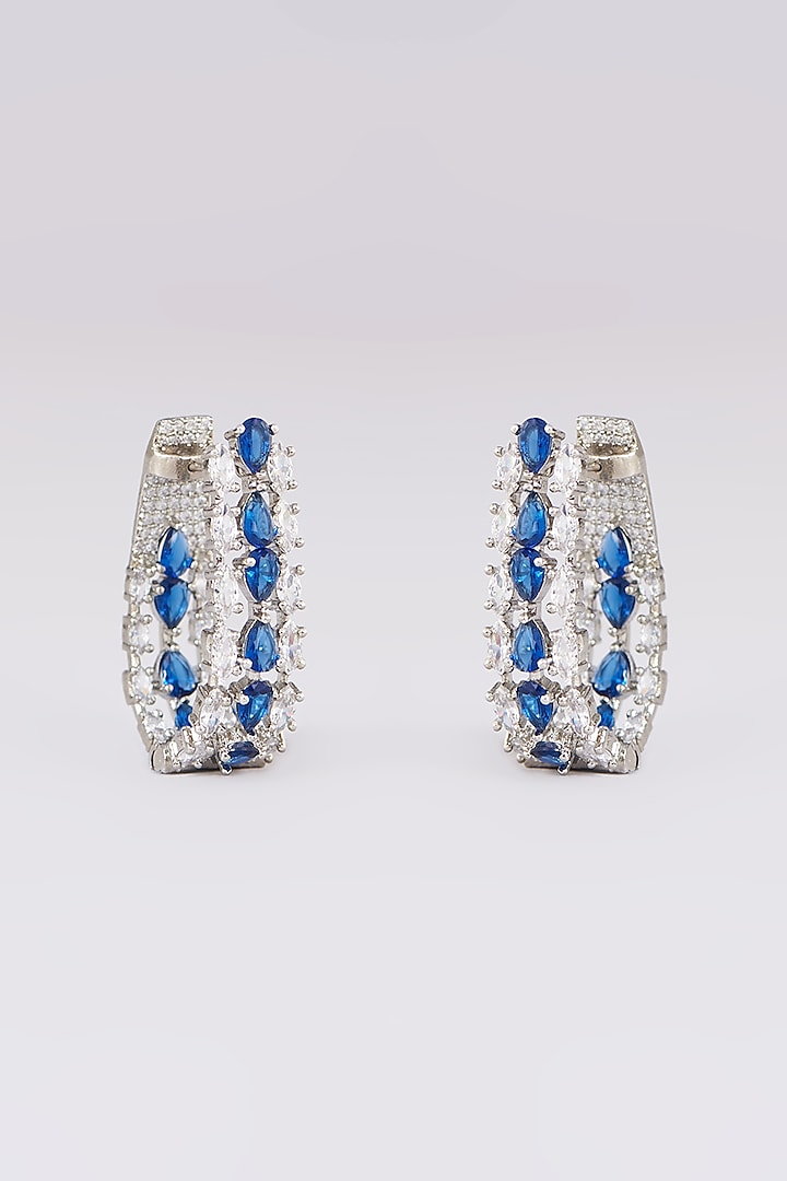 White Finish Faux Diamond & Blue Stone Stud Earrings by Zevar by Geeta