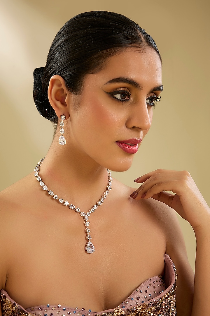 White Finish Diamond Pendant Necklace Set by Zevar By Geeta at Pernia's Pop Up Shop