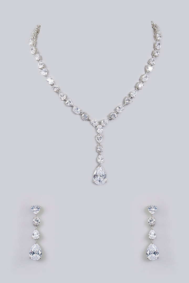 White Finish Diamond Pendant Necklace Set by Zevar By Geeta at Pernia's Pop Up Shop
