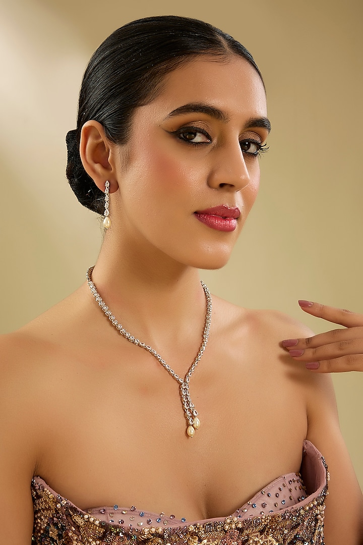 White Finish Diamond & Pearl Pendant Necklace Set by Zevar By Geeta at Pernia's Pop Up Shop