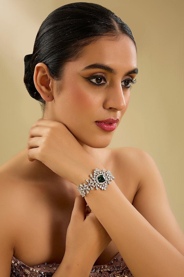 White Finish Diamond & Emerald Stone Bracelet by Zevar By Geeta at Pernia's Pop Up Shop