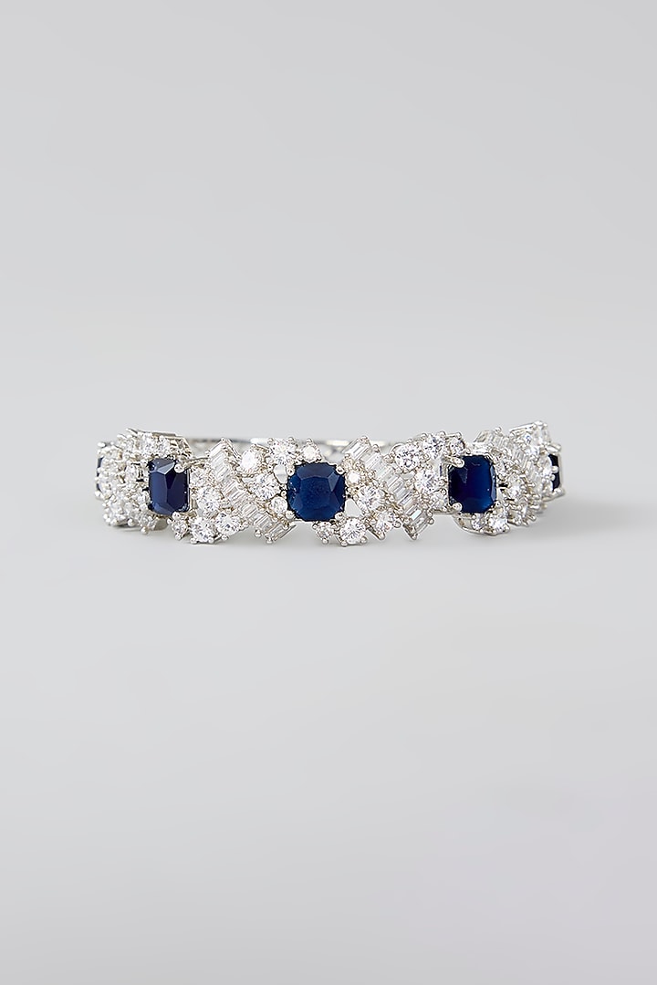 White Finish Diamond & Blue Stone Bracelet by Zevar By Geeta at Pernia's Pop Up Shop