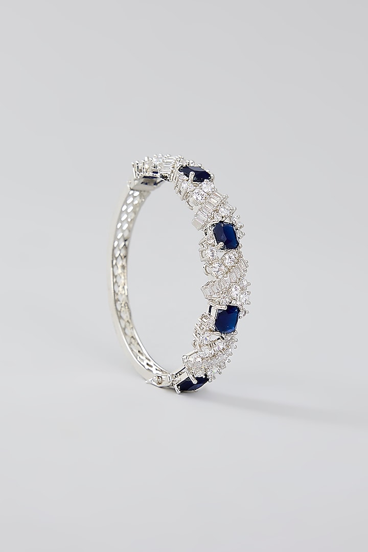 White Finish Diamond & Blue Stone Bracelet by Zevar By Geeta at Pernia's Pop Up Shop