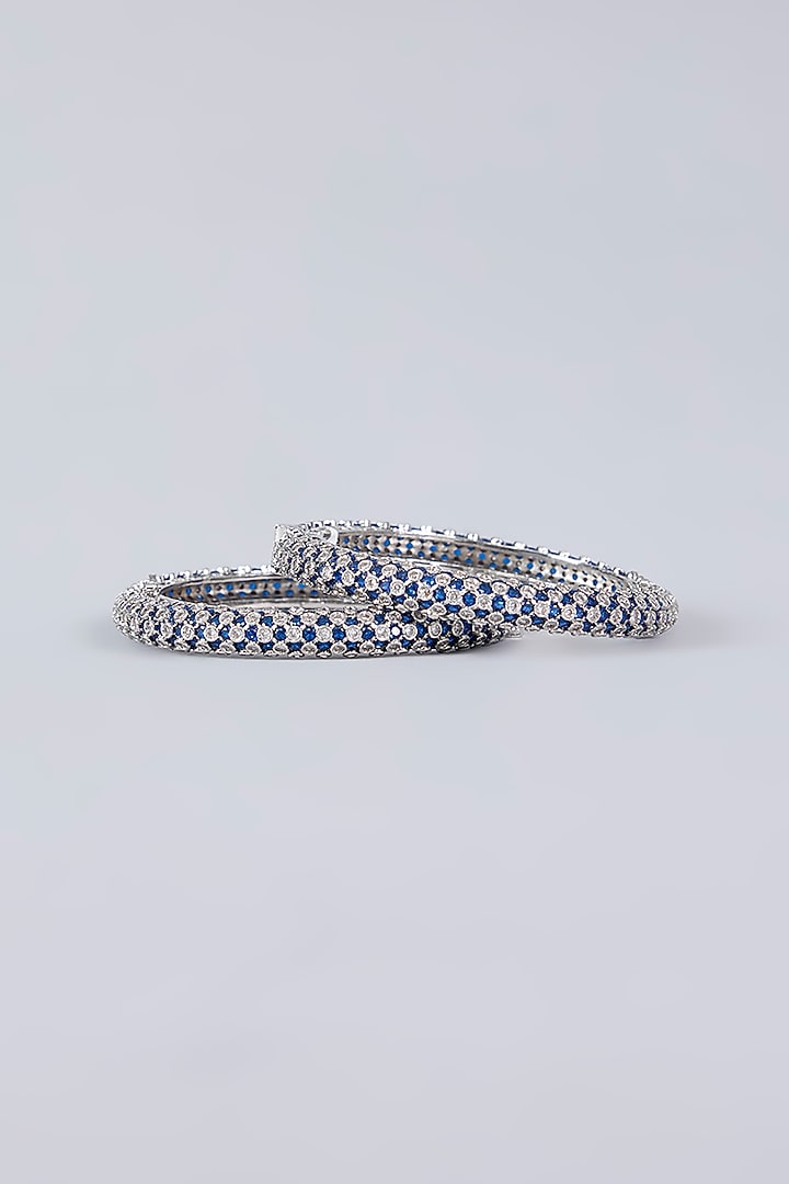 White Finish Diamond & Blue Sapphire Stone Openable Bangles (Set Of 2) by Zevar by Geeta at Pernia's Pop Up Shop