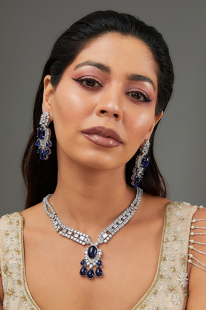 White Finish Faux Diamond & Blue Stone Necklace Set by Zevar By Geeta