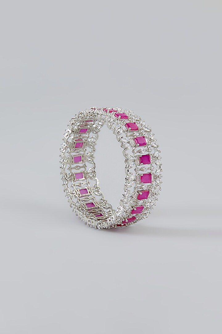 White Finish Faux Diamond & Pink Stone Bangles (Set of 2) by Zevar By Geeta at Pernia's Pop Up Shop