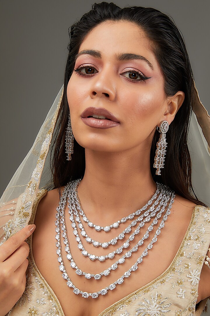White Finish Faux Diamond Layered Necklace Set by Zevar By Geeta