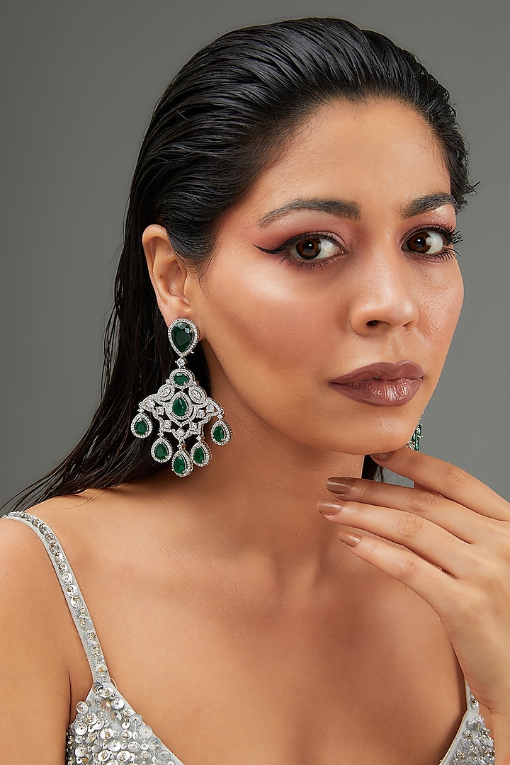 White Finish Faux Diamond & Green Stone Dangler Earrings by Zevar By Geeta