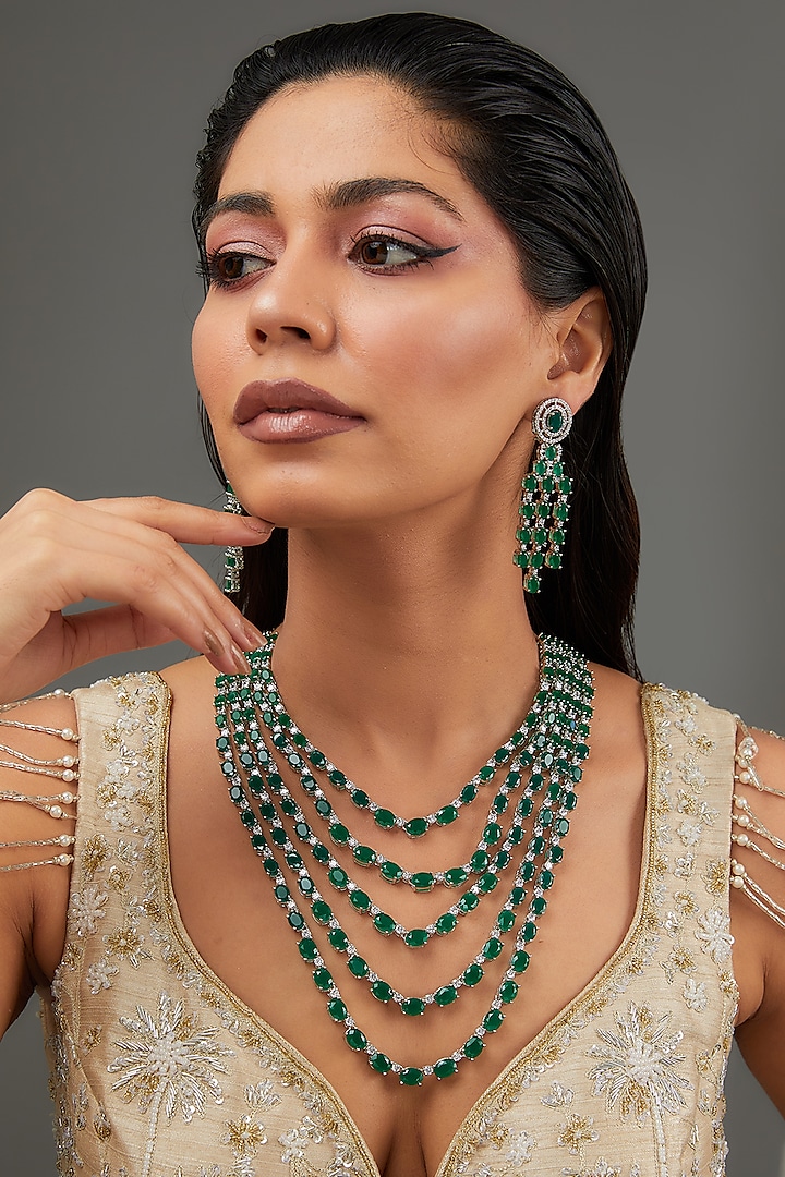 White Finish Faux Diamond & Emerald Layered Necklace Set by Zevar By Geeta