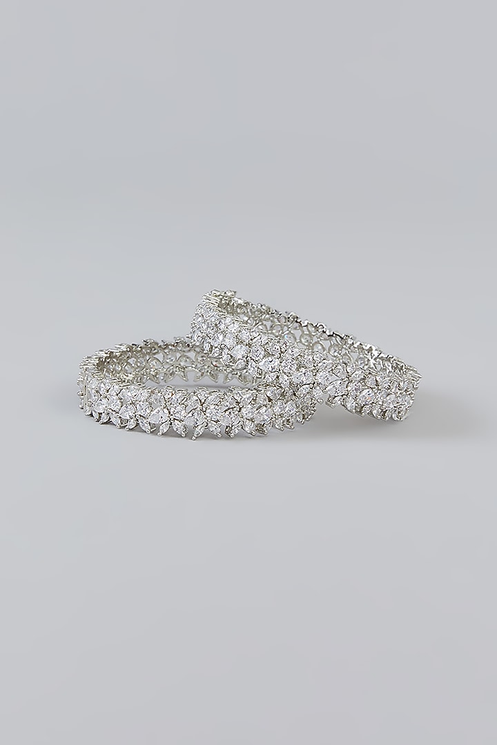 White Finish Faux Diamond Bangles (Set of 2) by Zevar By Geeta at Pernia's Pop Up Shop