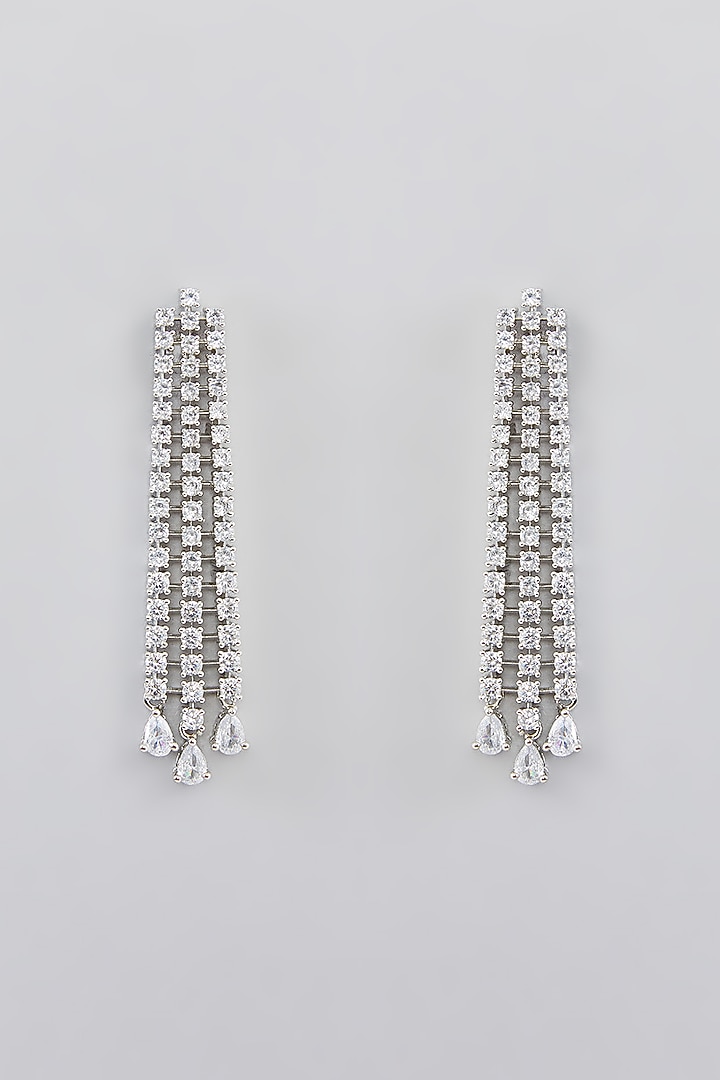White Finish Faux Diamond Dangler Earrings by Zevar By Geeta at Pernia's Pop Up Shop