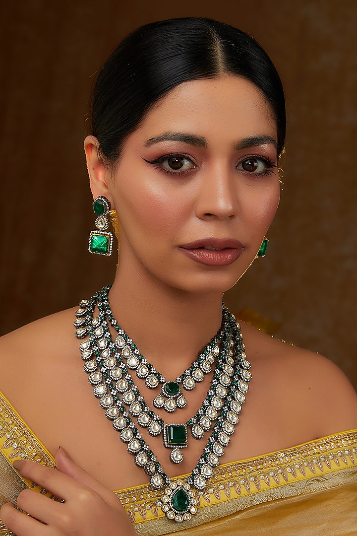 Black Rhodium Finish Kundan Polki & Emerald Layered Necklace Set by Zevar By Geeta at Pernia's Pop Up Shop