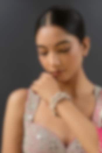 Gold Finish Kundan Polki & Blue Resin Openable Bangles by Zevar By Geeta at Pernia's Pop Up Shop