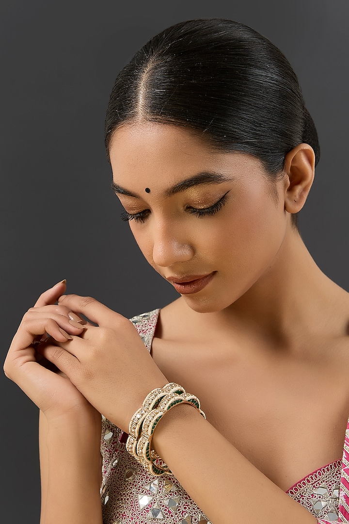 Gold Finish Kundan Polki & Green Resin Openable Bangles by Zevar By Geeta at Pernia's Pop Up Shop