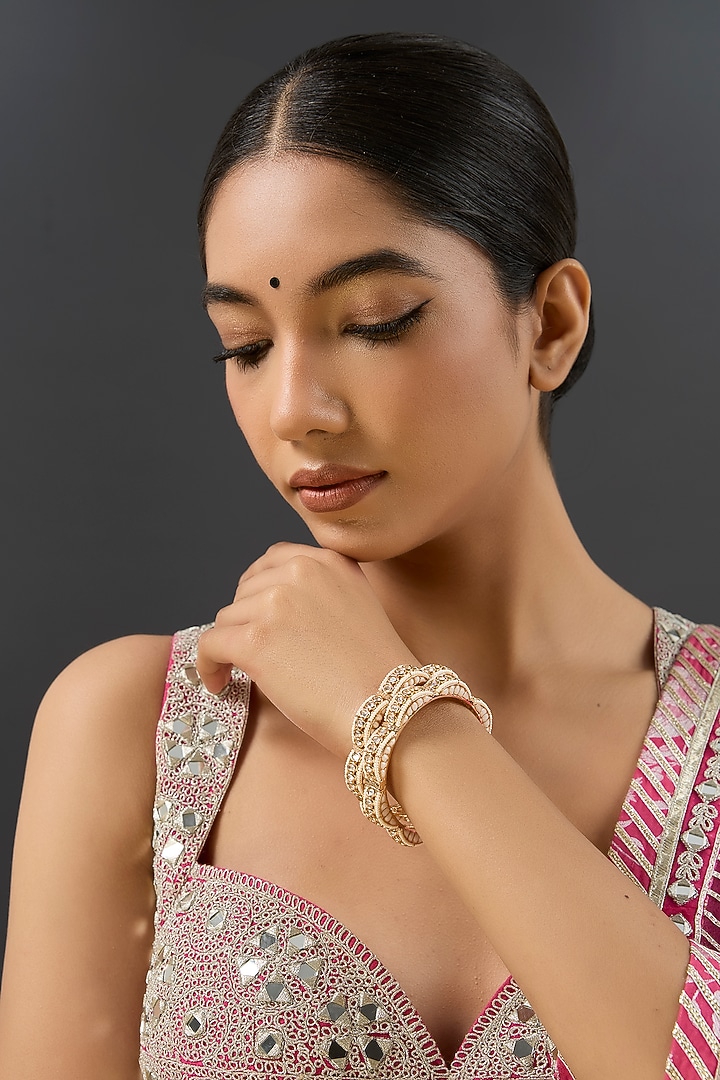 Gold Finish Kundan Polki & White Resin Openable Bangles by Zevar By Geeta at Pernia's Pop Up Shop