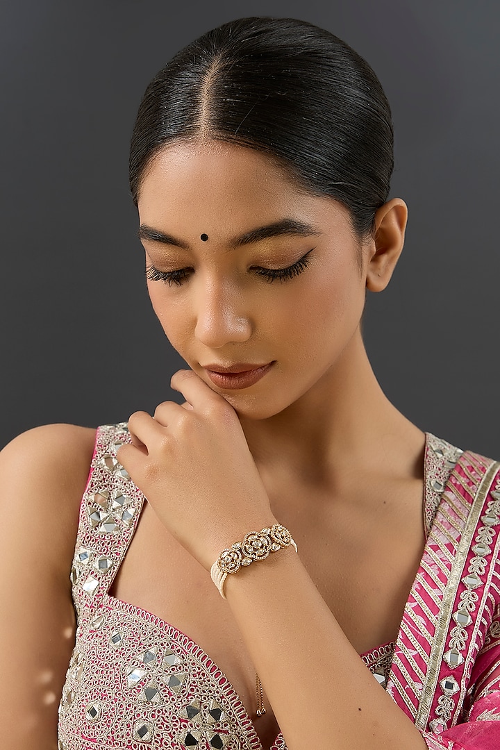 Gold Finish Kundan Polki & Pearl Adjustable Bracelet by Zevar By Geeta at Pernia's Pop Up Shop