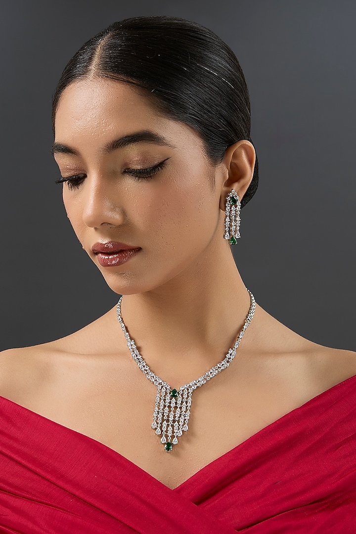 White Finish Diamond & Green Stone Long Pendant Necklace Set by Zevar By Geeta at Pernia's Pop Up Shop
